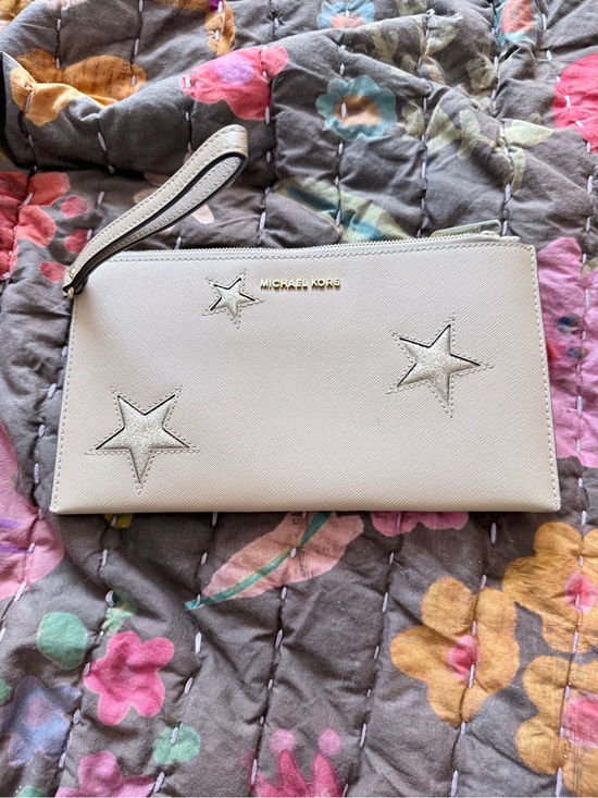 Michael Kors Handbags - Michael Kors Ivory Star Appliqué Wristlet